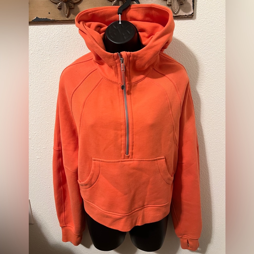 Warm coral half zip Scuba, Lululemon.